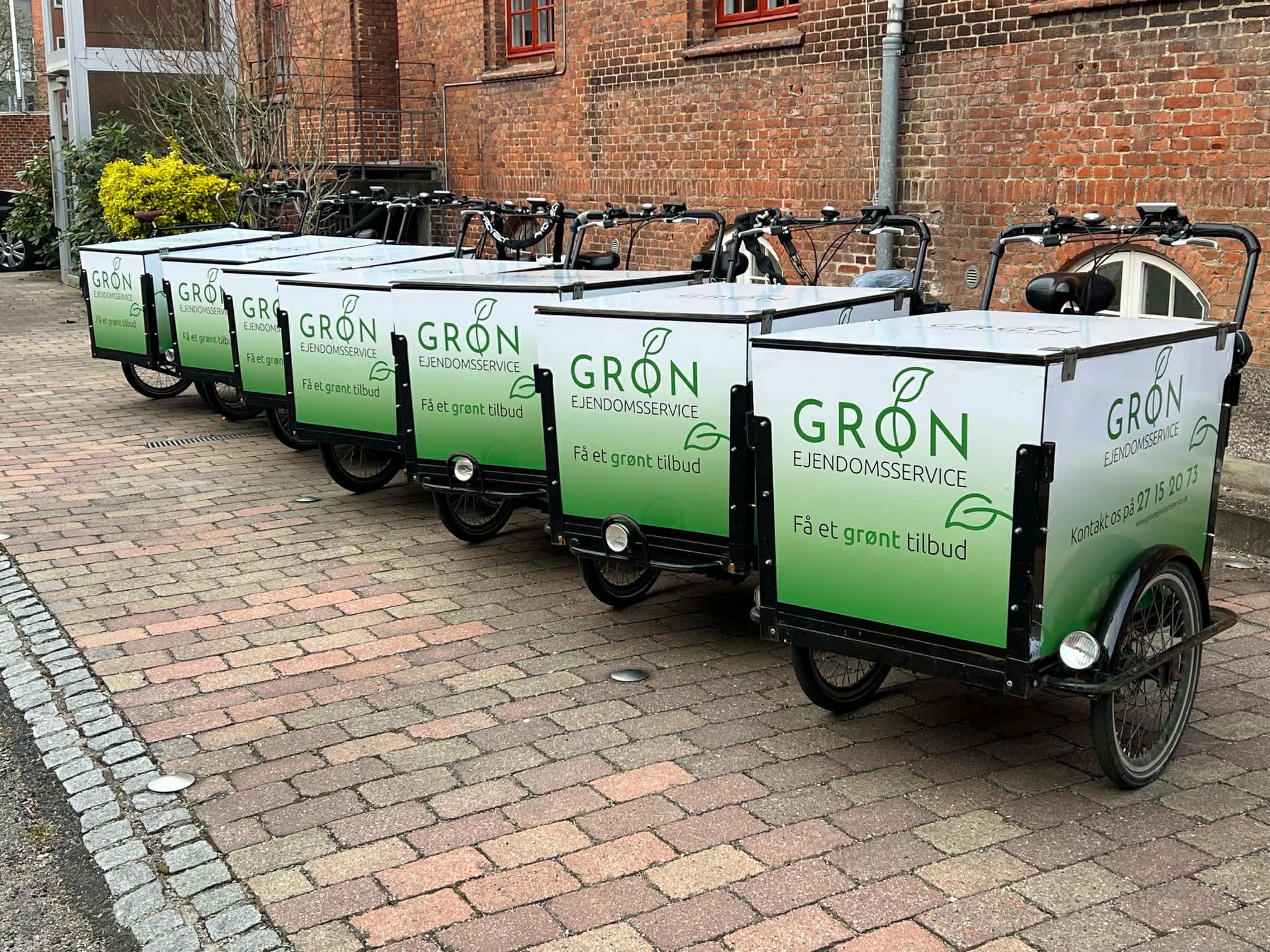 Bilreklame Grøn Ejendomsservice  flåde varevogne